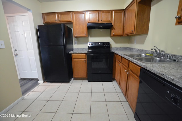 404 La Fontenay Ct, Louisville, KY 40223 - kitchen featuring under cabinet range hood, brown cabinets, a sink, and black appliances
