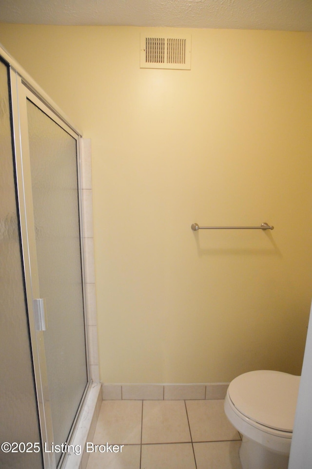 404 La Fontenay Ct, Louisville, KY 40223 - full bath featuring visible vents, a stall shower, tile patterned floors, baseboards, and toilet