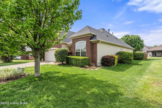 view of front of home with brick siding, a front yard, driveway, and roof with shingles