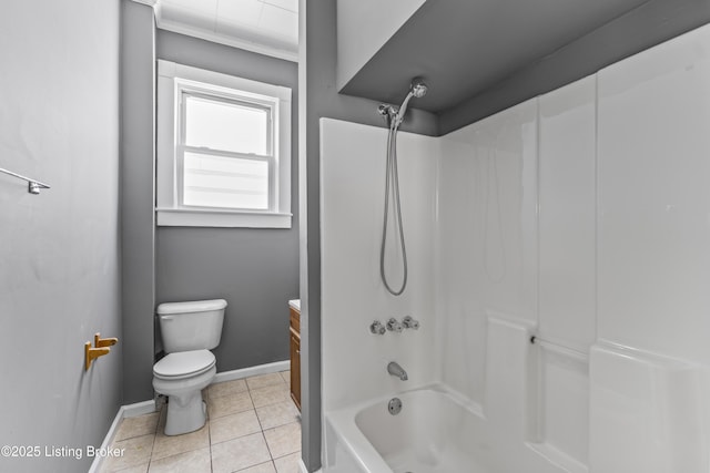full bath with vanity, bathtub / shower combination, toilet, tile patterned floors, and baseboards