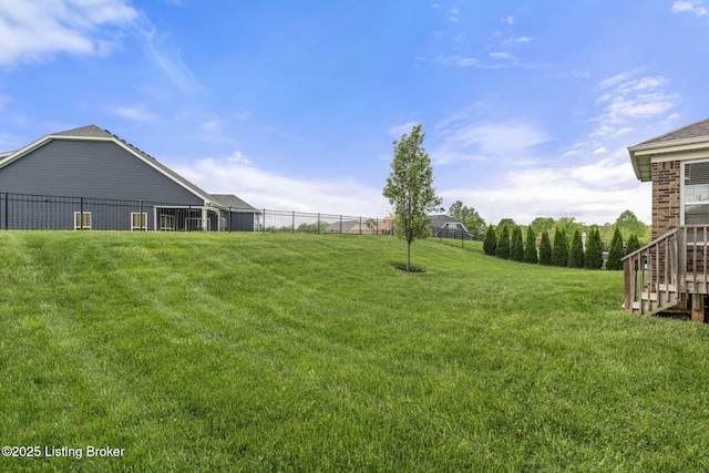 view of yard featuring fence