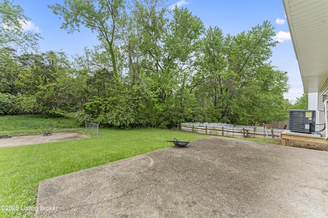 view of patio / terrace with fence and cooling unit