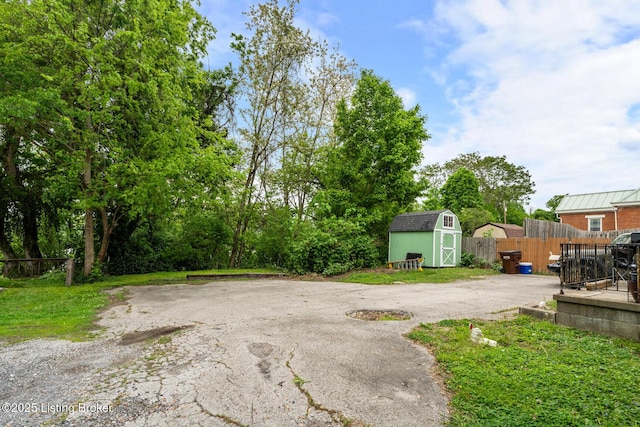 717 Highland Ave, Carrollton, KY 41008 - view of yard with fence, an outbuilding, and a shed