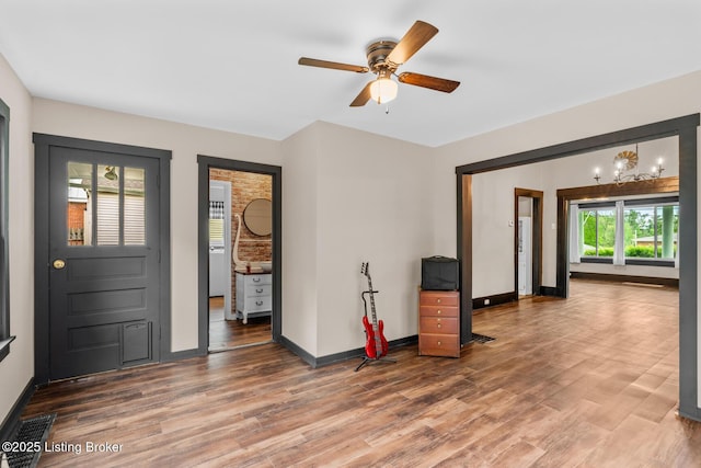 717 Highland Ave, Carrollton, KY 41008 - foyer featuring baseboards, ceiling fan, and wood finished floors