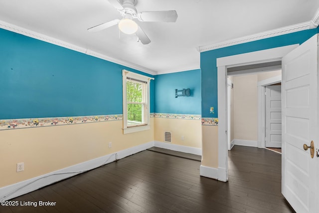 717 Highland Ave, Carrollton, KY 41008 - unfurnished bedroom featuring crown molding, a ceiling fan, baseboards, visible vents, and dark wood-style floors