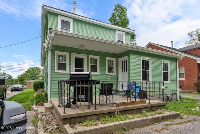 717 Highland Ave, Carrollton, KY 41008 - back of house featuring covered porch