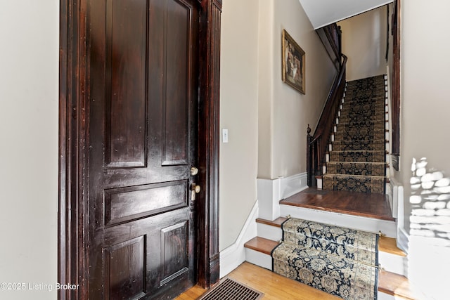 1332 S 2nd St, Louisville, KY 40208 - foyer featuring light wood-style flooring and stairway