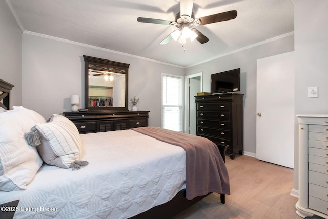 7411 Colt Dr, Louisville, KY 40214 - bedroom with crown molding, light wood-style flooring, and ceiling fan