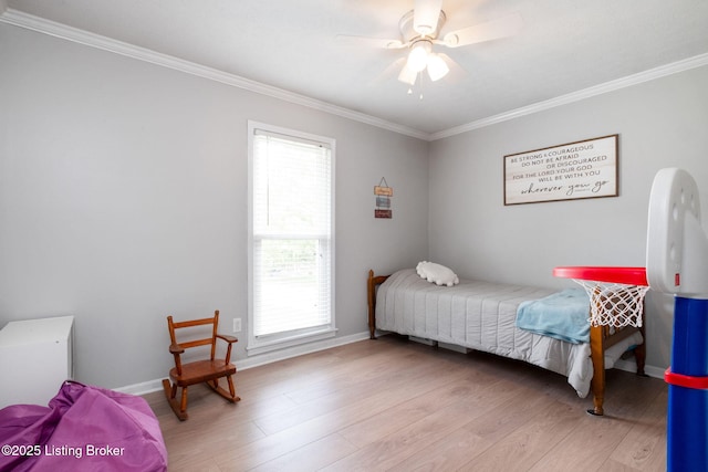 7411 Colt Dr, Louisville, KY 40214 - bedroom with crown molding, baseboards, ceiling fan, and wood finished floors