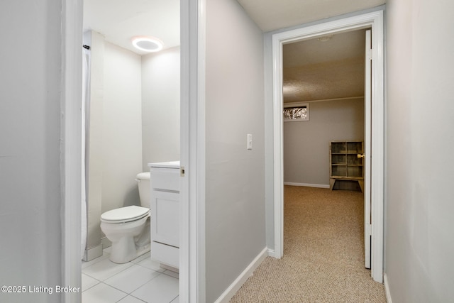 7411 Colt Dr, Louisville, KY 40214 - bathroom featuring baseboards and toilet