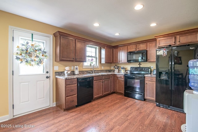 450 Rolling Way, Smiths Grove, KY 42171 - kitchen with recessed lighting, a sink, wood finished floors, and black appliances