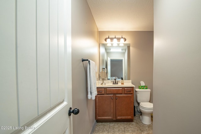 450 Rolling Way, Smiths Grove, KY 42171 - bathroom featuring toilet, baseboards, tile patterned flooring, and vanity