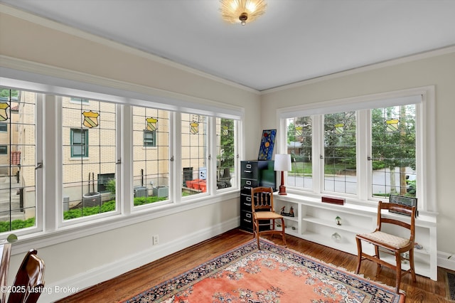 2335 Bonnycastle Ave, Louisville, KY 40205 - sitting room with plenty of natural light, wood finished floors, ornamental molding, and baseboards