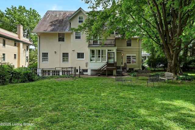 2335 Bonnycastle Ave, Louisville, KY 40205 - rear view of property with a balcony, stucco siding, and entry steps