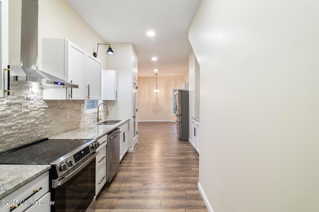 209 W High St, Lebanon, KY 40033 - kitchen with a sink, wall chimney range hood, recessed lighting, backsplash, and appliances with stainless steel finishes