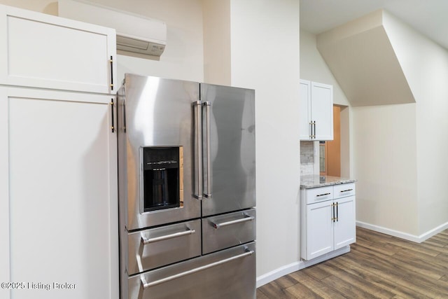 209 W High St, Lebanon, KY 40033 - kitchen with high end fridge, white cabinetry, dark wood-style floors, light stone countertops, and baseboards