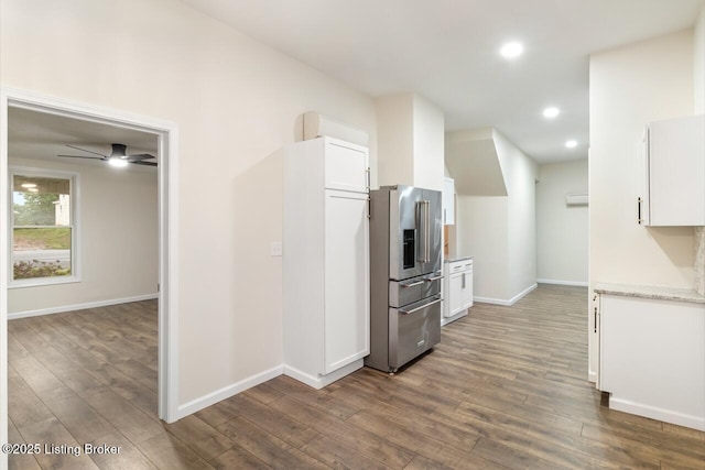 209 W High St, Lebanon, KY 40033 - kitchen featuring high end refrigerator, recessed lighting, dark wood-style flooring, and white cabinets