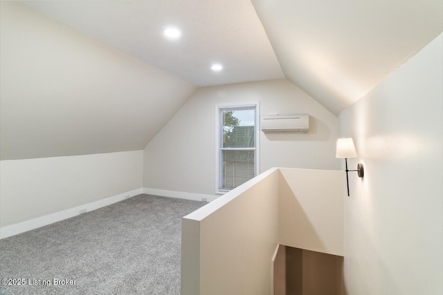 209 W High St, Lebanon, KY 40033 - additional living space with lofted ceiling, a wall mounted air conditioner, carpet, recessed lighting, and baseboards