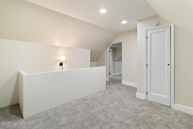 209 W High St, Lebanon, KY 40033 - additional living space featuring carpet flooring, vaulted ceiling, baseboards, and recessed lighting
