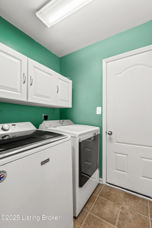 laundry room with cabinet space and washer and dryer
