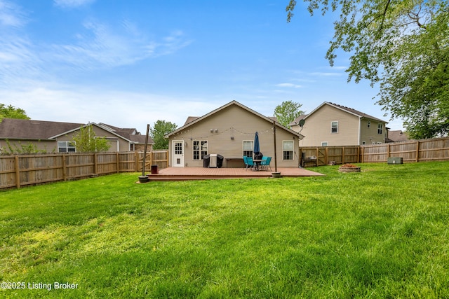 rear view of house featuring a deck