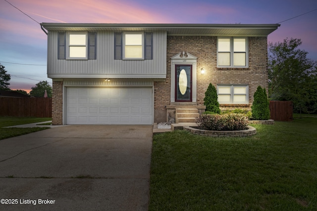 120 Emily Dr, Mt Washington, KY 40047 - raised ranch with brick siding, driveway, and an attached garage