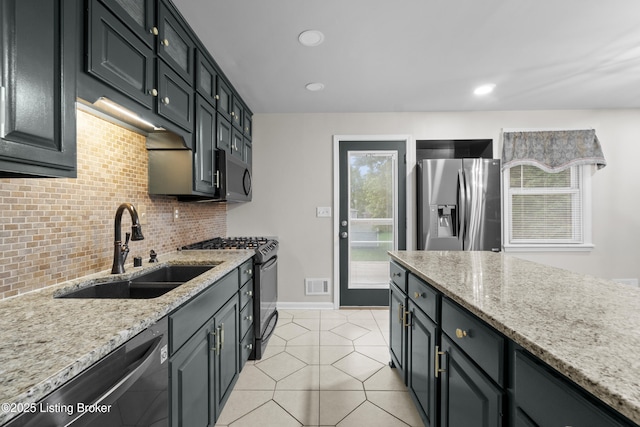 120 Emily Dr, Mt Washington, KY 40047 - kitchen featuring black appliances, decorative backsplash, light stone counters, light tile patterned flooring, and recessed lighting