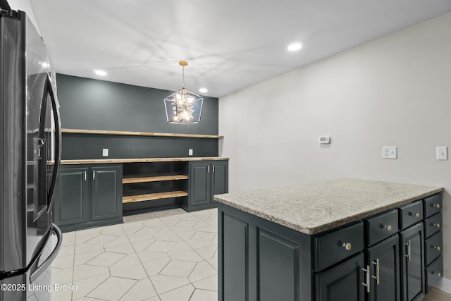 120 Emily Dr, Mt Washington, KY 40047 - kitchen featuring stainless steel fridge with ice dispenser, open shelves, recessed lighting, light countertops, and decorative light fixtures