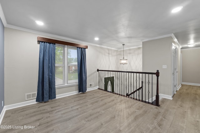 120 Emily Dr, Mt Washington, KY 40047 - spare room featuring wood finished floors, ornamental molding, and recessed lighting