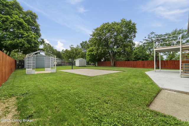 120 Emily Dr, Mt Washington, KY 40047 - fenced backyard with a storage shed and a patio