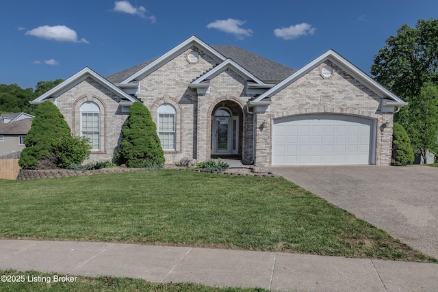 5503 Vevia Pl, Louisville, KY 40272 - french country home with concrete driveway, brick siding, an attached garage, and a front yard