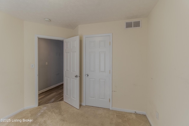 5503 Vevia Pl, Louisville, KY 40272 - unfurnished bedroom featuring light carpet and baseboards