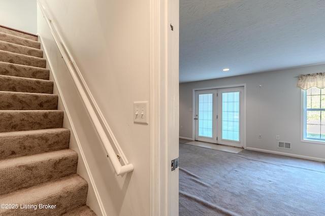 5503 Vevia Pl, Louisville, KY 40272 - stairs featuring carpet flooring, baseboards, a textured ceiling, and recessed lighting