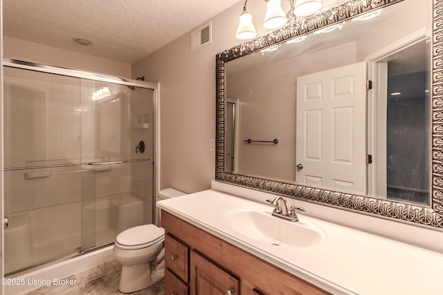 5503 Vevia Pl, Louisville, KY 40272 - bathroom with toilet, a shower stall, vanity, and a textured ceiling