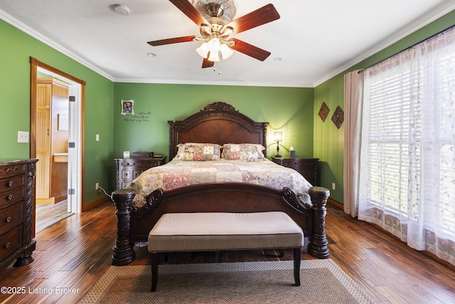 bedroom with crown molding, a ceiling fan, and hardwood / wood-style floors