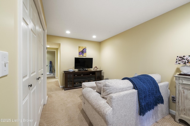 bedroom featuring light colored carpet, recessed lighting, and baseboards