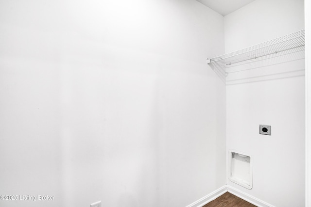 washroom with baseboards, hookup for an electric dryer, laundry area, and dark wood-type flooring