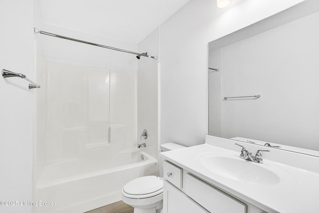 bathroom with vanity, toilet, and bathing tub / shower combination
