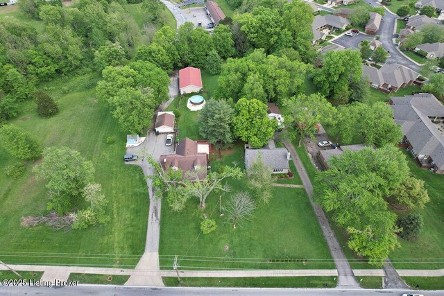 aerial overview of property's location with nearby suburban area