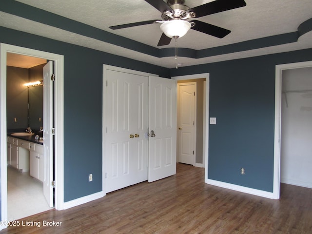 1253 Shepard Way, Shelbyville, KY 40065 - unfurnished bedroom with a sink, baseboards, and a raised ceiling