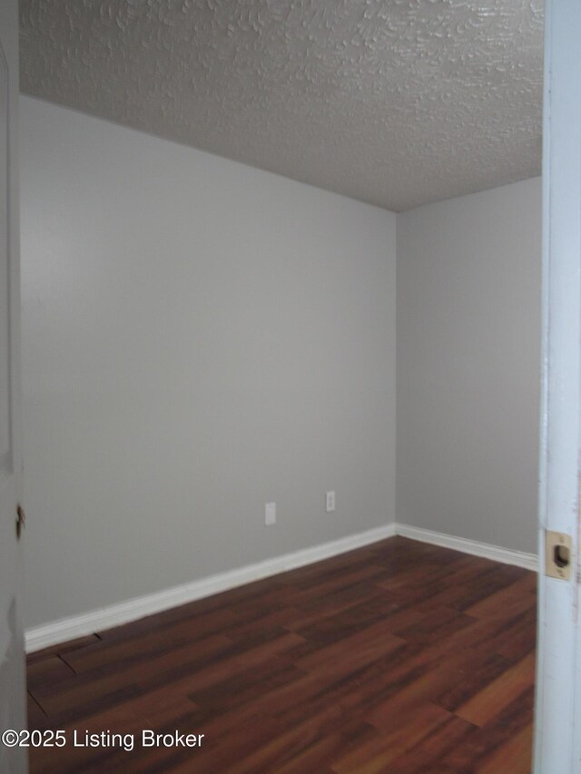 1253 Shepard Way, Shelbyville, KY 40065 - empty room with baseboards, a textured ceiling, and wood finished floors