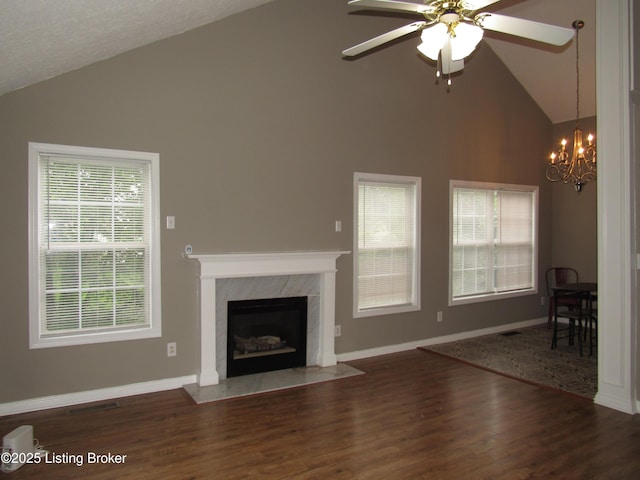 1253 Shepard Way, Shelbyville, KY 40065 - unfurnished living room with high vaulted ceiling, wood finished floors, ceiling fan with notable chandelier, and a fireplace
