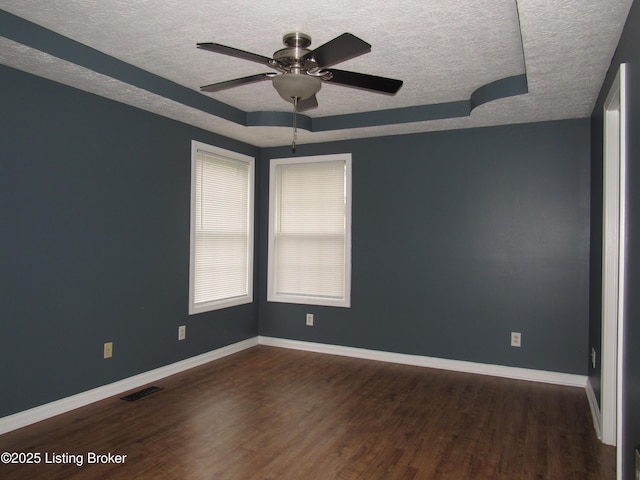 1253 Shepard Way, Shelbyville, KY 40065 - empty room featuring a textured ceiling, a ceiling fan, baseboards, wood finished floors, and visible vents