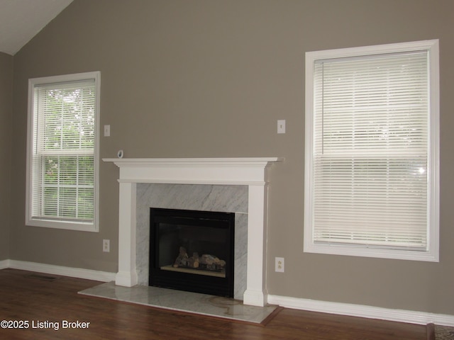 1253 Shepard Way, Shelbyville, KY 40065 - unfurnished living room featuring a premium fireplace, baseboards, vaulted ceiling, and wood finished floors
