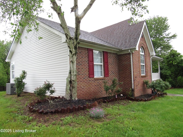 1253 Shepard Way, Shelbyville, KY 40065 - view of property exterior featuring a yard, brick siding, central AC, and roof with shingles