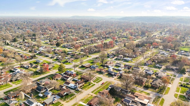 birds eye view of property with a residential view