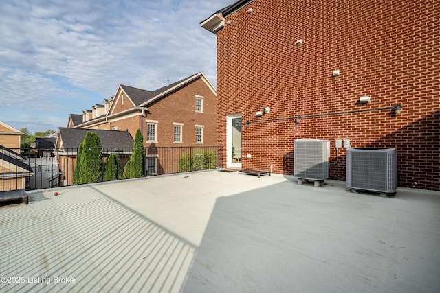 9410 Norton Comnons Blvd, Prospect, KY 40059 - back of house with cooling unit, a patio area, fence, and brick siding