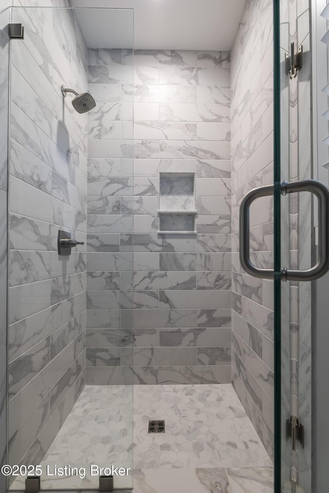 bathroom with a stall shower