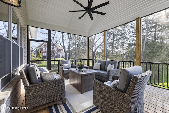 sunroom / solarium with an outdoor hangout area and a ceiling fan