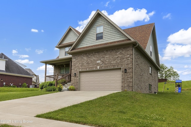9102 Pinnacle Place Dr, Louisville, KY 40272 - view of front of home with a garage, driveway, a front yard, and brick siding